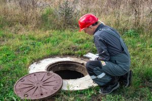 Septic system technician at work